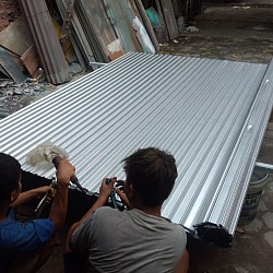 Perakitan rolling door galvanis